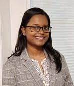 Deborah Prabhu, Registered Massage Therapist (RMT), offering therapeutic massage treatment in a professional clinical environment.