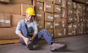 images-2 Physiotherapist assisting a patient with a WSIB work related injury in Oakville clinic