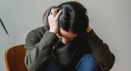 Discomfort from a cervicogenic headache caused by neck tension or cervical spine issues